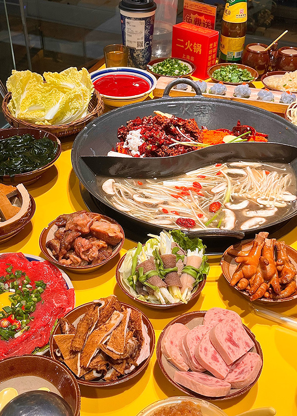 Lunch (12:30 PM - 2:00 PM): The Ultimate Chongqing Experience - Hot Pot